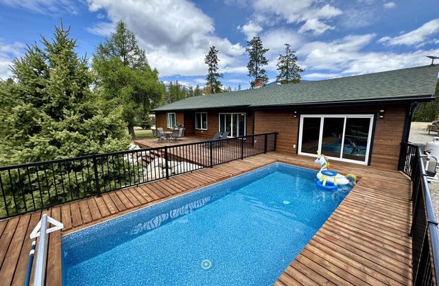 Large mountain home with heated pool and hot tub. Family getaway in Valemount