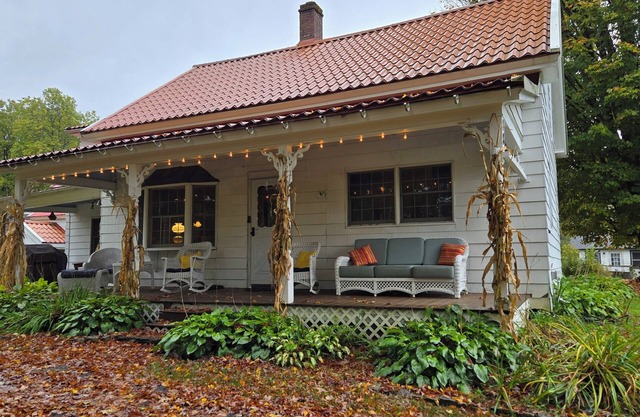 Large rustic home with gameroom. Near lakes, skiing, walk to downtown.