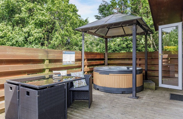 Large superior one-bedroom lodge with hot tub for two adults.