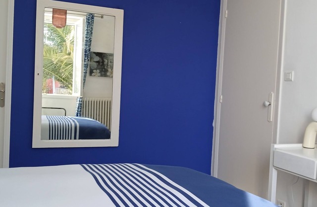 Le Chat Bleu apartment, adjoining owner's house shared garden
