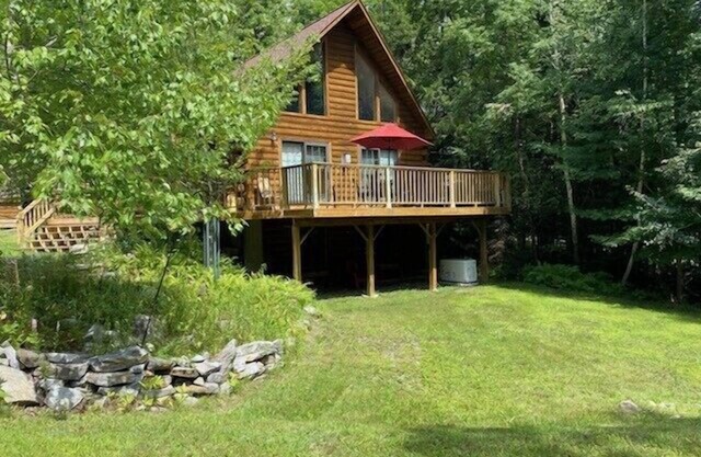 Light-Filled Log Home, 4 Wooded Acres, & Lake Access. The water is 0.4 mi away.