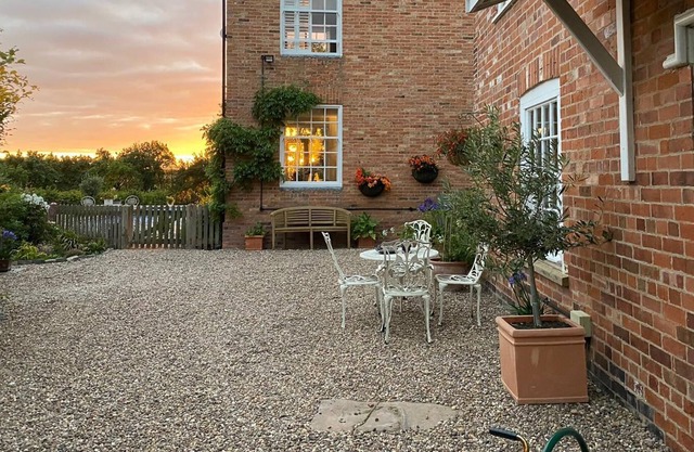 Listed self contained cottage a quiet elevated position with magnificent views