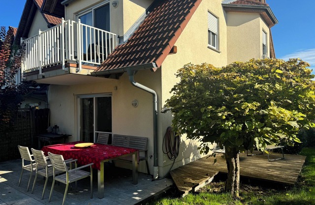 Living in the light-flooded Japandi house with Garden and wood-burning stove