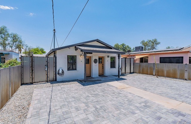 Located downtown this 1 bedroom 1 bathroom is fully remodeled with your own dedicated electric vehicle charger .