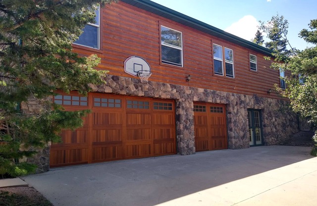 Location! Nice log home in dark sky community next to several peaks