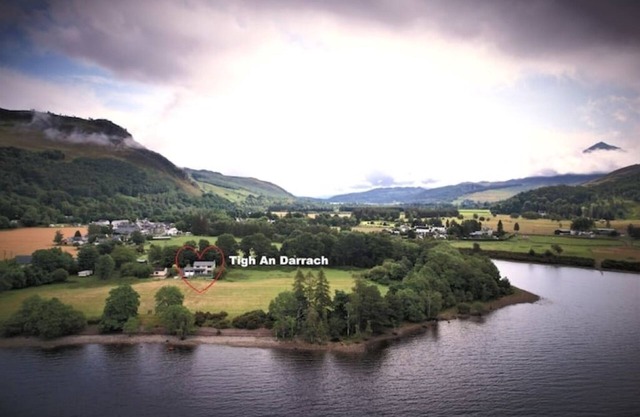 Lochside Luxury . A gorgeous modern house with stunning views.