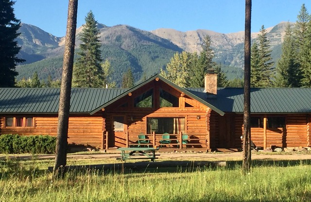 Log Cabin with Stunning Mountain Views near Swan River and Holland Lake.