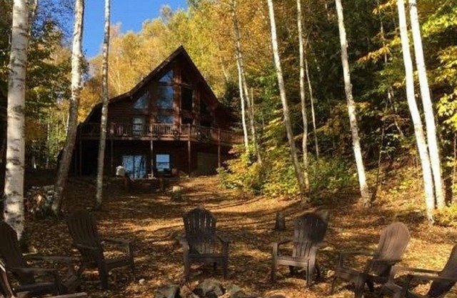 Log Home Luxury awaits on the west shore of AuTrain Lake!