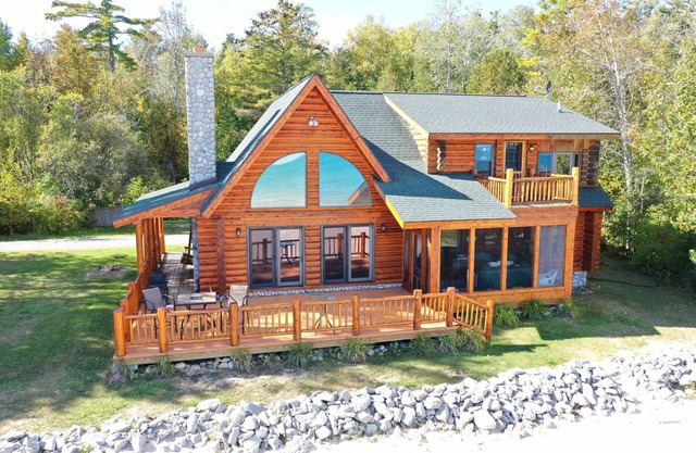 Log Home On Lake Huron Sandy Beach. Located just north of Harrisville Michigan.
