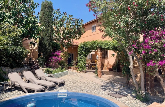 Loma Alta; a unique 19th century cave house with lush garden and private pool