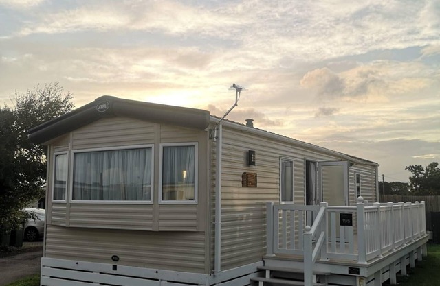 Lovely caravan with decking at Solent Breeze in Hampshire ref 38195SB