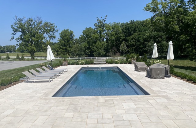 Lovely home with river views on 6 acres with pool and chipping green!