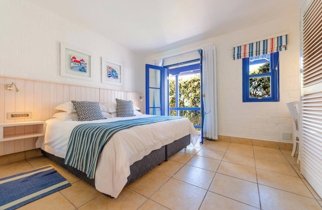 Luxe Beachside Retreat | Patio | Resort Perks