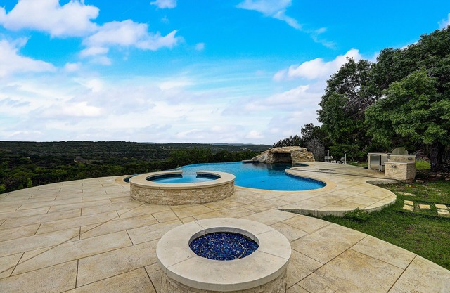 Luxe designer Hill Country home near Austin with amazing views & infinity pool