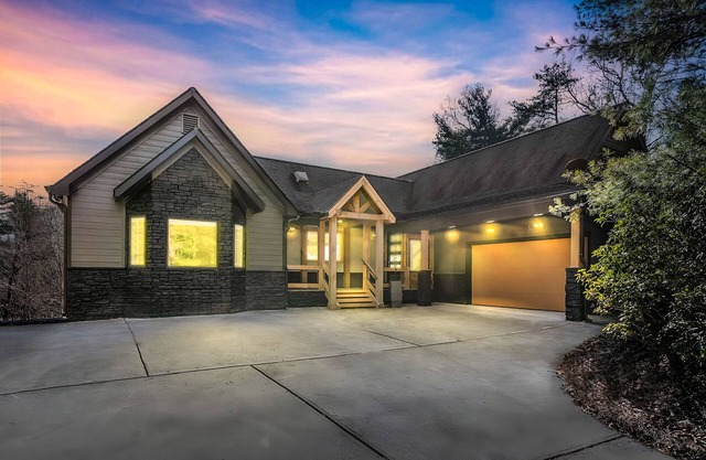 Luxe designer home with epic entertaining space, hot tub & movie room