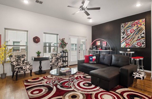 Luxurious Condo w/Premium Amenities! Rooftop Retreat w views of stadiums, private garage & gated entry
