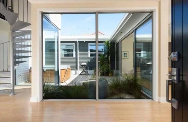 Luxurious modern Beach Getaway with spa pool. Only 150m to white sandy beach