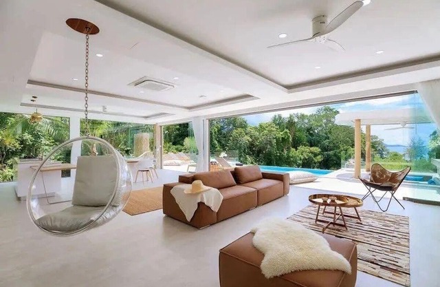 Luxurious 4-bedroom villa with infinity pool, private cinema, gym, and stunning sea views