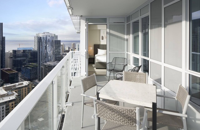 Luxury 2-BR Sky Suite with Stunning Views, Pools, & Top Seattle Amenities