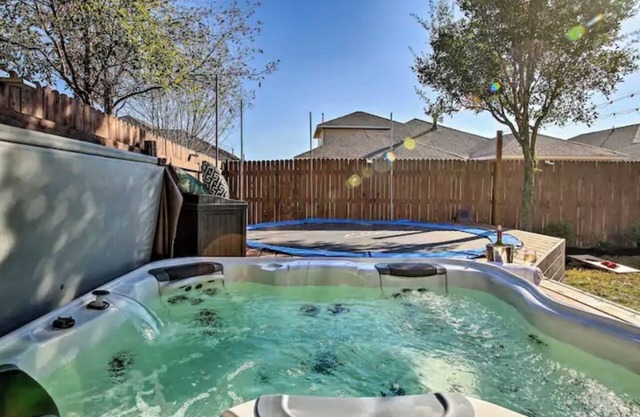 Luxury Home with Spa, Trampoline, Outdoor living, & massive living spaces!