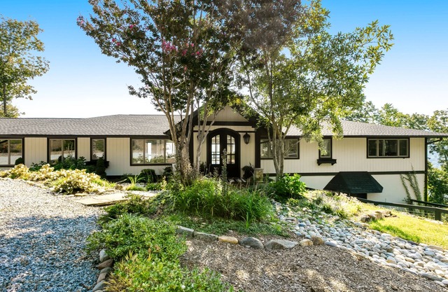 Luxury home with spectacular view, hot tub, decks, rec room, & yoga space