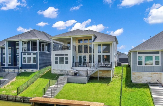 Luxury Lake Conroe Retreat: 5 Bedrooms, Private Dock, Balconies & Stunning Canal Views!