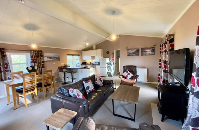 Luxury lodge situated on a tranquil holiday park