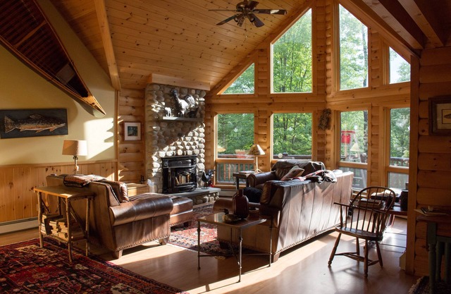 Luxury Log Cabin Style Family House, gorgeous wooded and private setting.