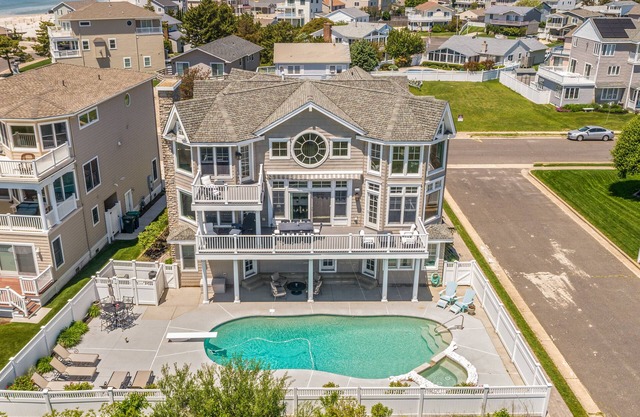 Luxury Ocean Front Mansion with Heated Pool, Elevator, Grill and Suites Galore