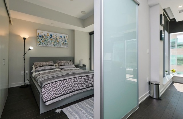 Luxury one bedroom w patio steps from parliament