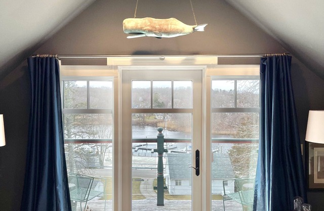 Luxury one bedroom with private roof deck overlooking River in Westerly, RI.