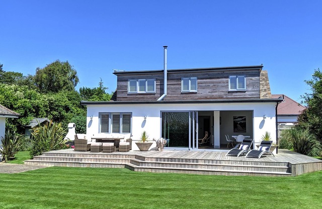 Luxury seaside home with beautiful south facing garden on private sea estate.