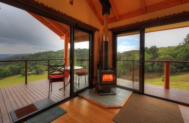 Luxury self-contained villa with king bed, double spa, fireplace, and kitchen.