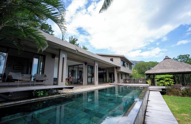 Luxury Villa Peaceful, highlights the natural surroundings and tranquility.