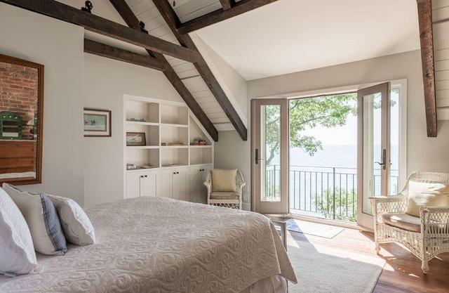 Magnificent lakefront home with private sand beach