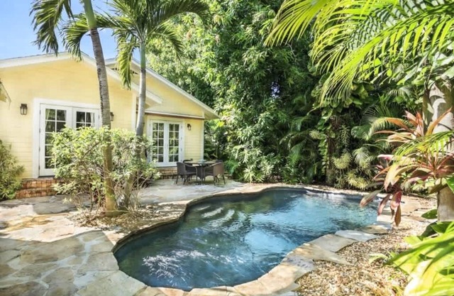 Mango Haus - Savor Tropical Living by a Lush Lagoon Pool