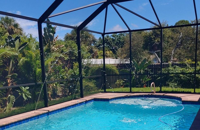 Master bedroom suite with pool. Eight minutes to beaches.