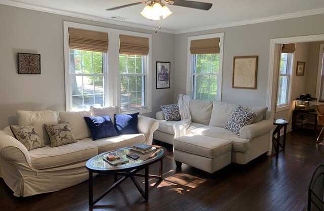 Masters rental with spacious back porch, fenced in yard, and park frontage.