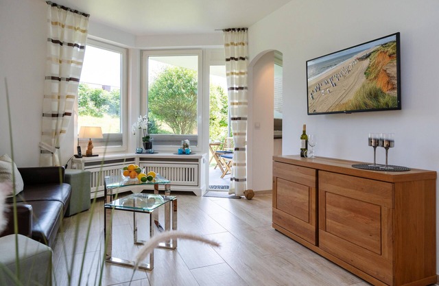 Modern 2-room apartment with terrace, parking space, WLAN. Pets allowed.