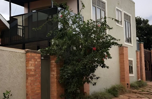 Modern 2 Story Guest House in Kigali with balcony views.