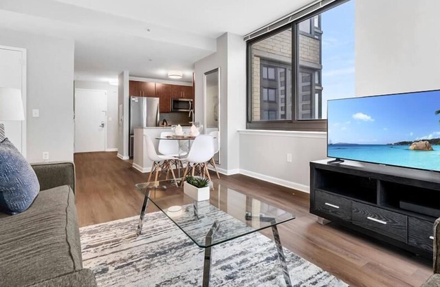 Modern 2BR | Business Center | Near PATH by GLS