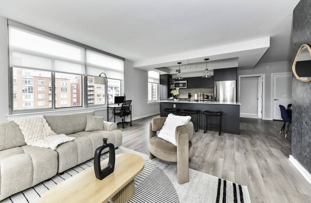 Modern 2BR Oasis with Scenic Rooftop & Gym ﻿