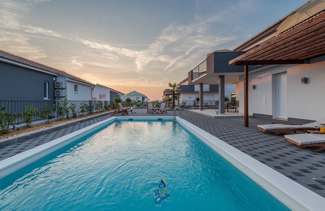 Modern 4 BD villa with heated pool for up to 8 guests