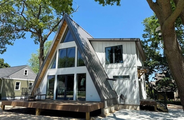 Modern A-frame situated only steps to beautiful Michigan and Muskegon beaches.
