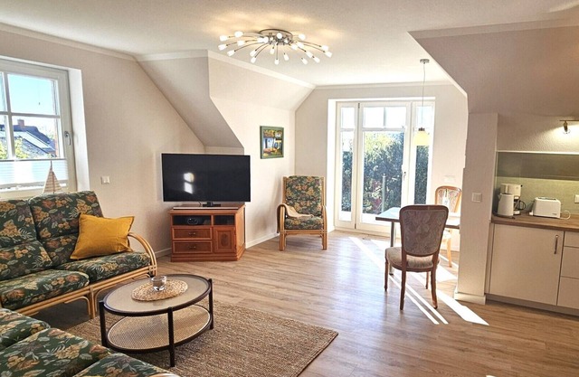 "Modern apartment with a view over the Wustrow dykes on the Baltic Sea!"