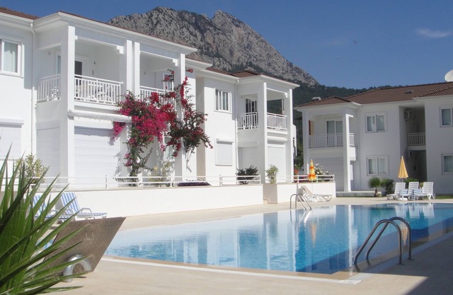 Modern apartment with pool and garden