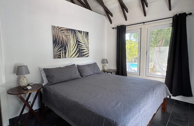 Modern Beachfront Home - Steps from the Sea w/Patio, Shared Pool & Dock