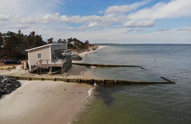 Modern Beachfront Cottage with Endless Bay Views