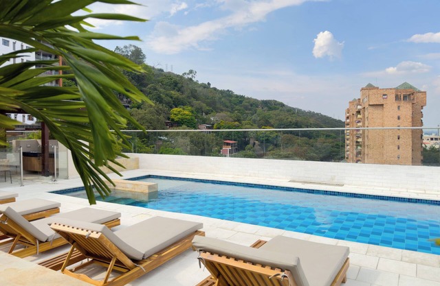 Modern, Bright, Quiet Apartment in Granada: A/C, Pool, Desk & Balcony