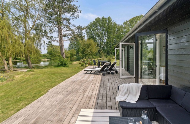 Modern cabin on large plot with own lake